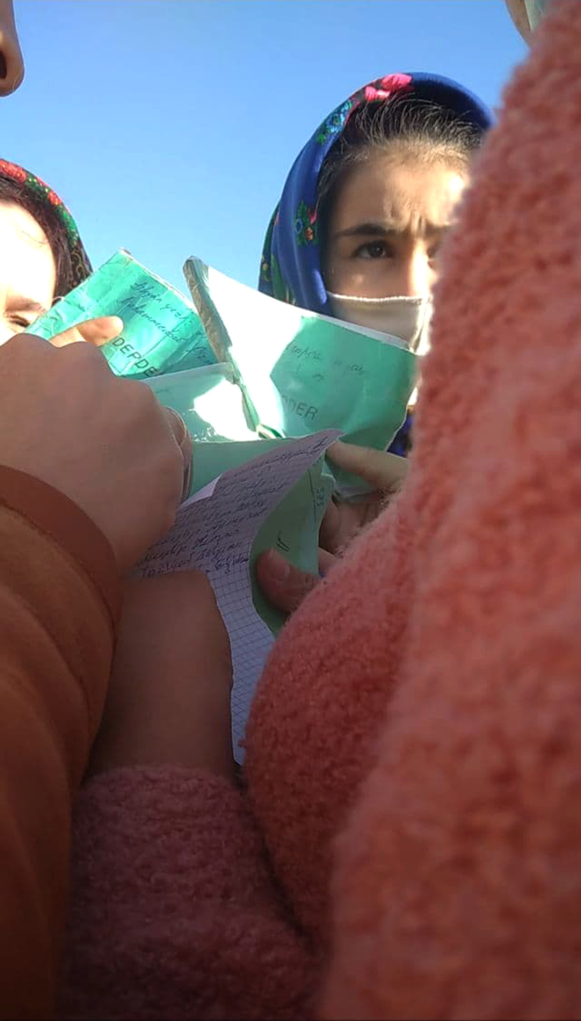 shop_manager_collects_food_cards_from_residents-1642608695